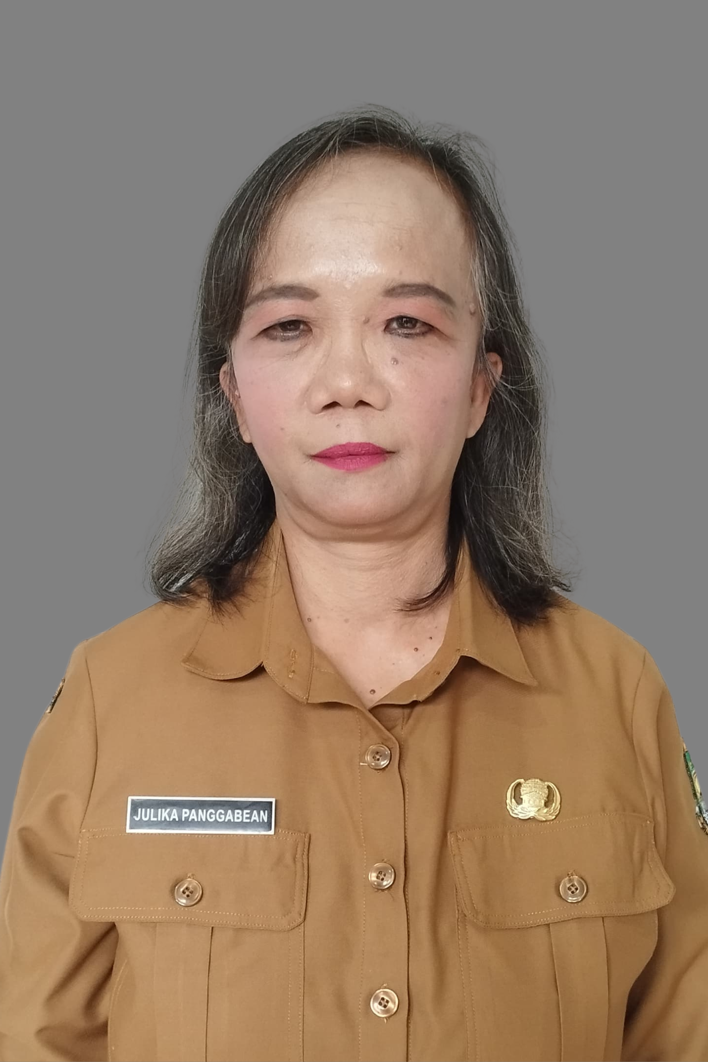 Julika Panggabean, M.Pd